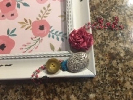 Close up of the decorative touches on the clock.