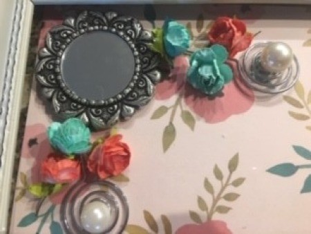 Close up of the decorative touches on the clock.