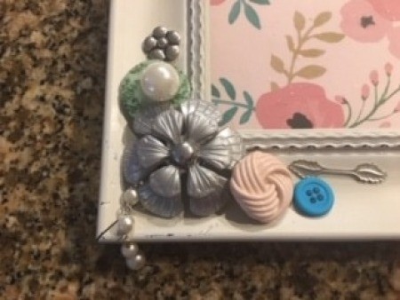 Close up of the decorative touches on the clock.