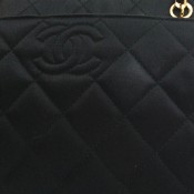 Removing a Spot on a Chanel Satin Purse? - whitish spot