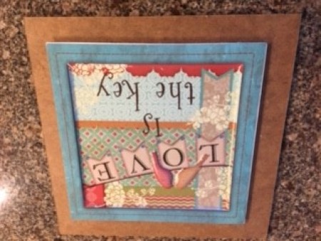 The artwork added to the square backing.