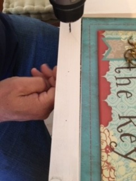 Adding in holes for the hooks.