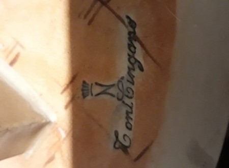 Signature on bottom of sculpture.