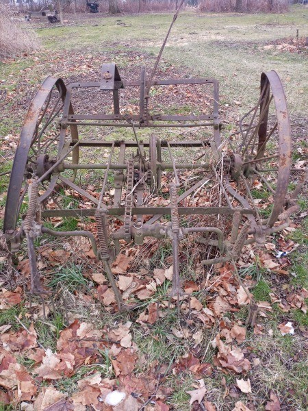 An old metal piece of farm equipment.