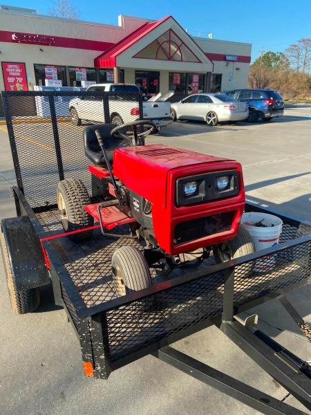 A red Daytona lawn tractor.