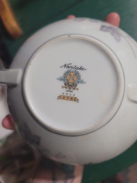 The bottom of a china teapot.