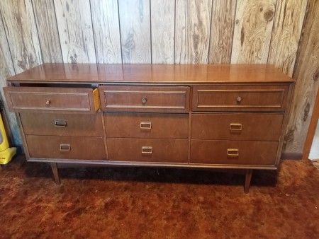 A long dresser with 9 drawers.
