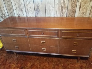 A long dresser with 9 drawers.