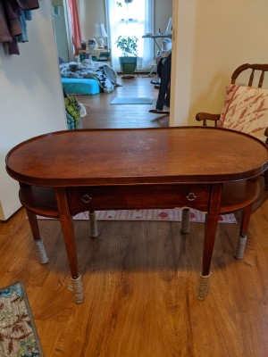 An oval wooden table.