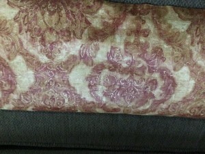 A roll of decorative wallpaper.