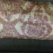 A roll of decorative wallpaper.