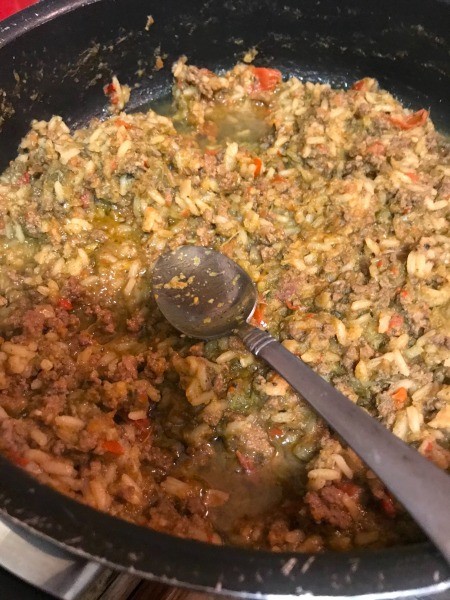 Stirring the stuffing mixture.