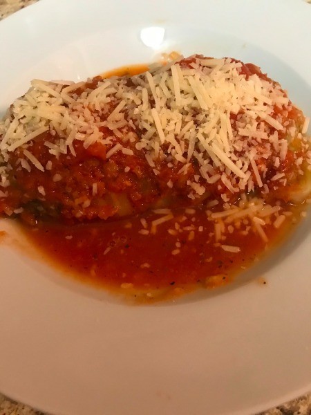 A cabbage roll on a plate.