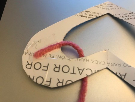 Yarn Heart Decoration - end of yarn taped to heart
