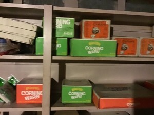 Boxes of vintage Corning Ware still in the boxes.