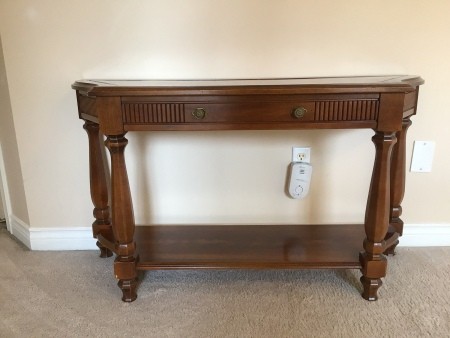 A wooden hall table.