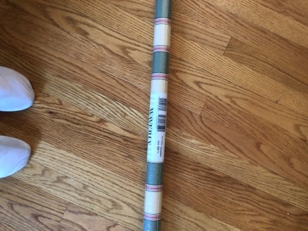 A roll of wallpaper.