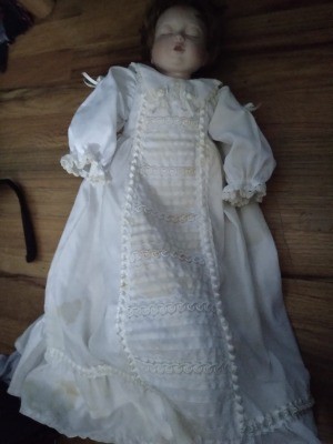 A porcelain baby doll.