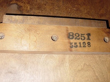 The numbers on the bottom of a dining chair.