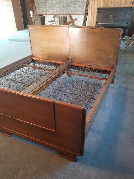An old bedframe with springs.
