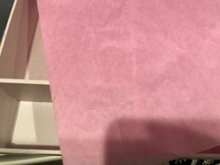 A piece of pink tissue paper.