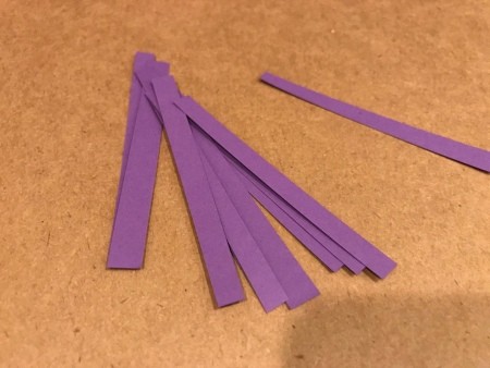 Strips of purple paper.