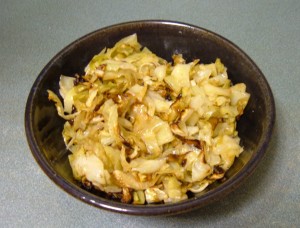 A bowl of roasted cabbage.