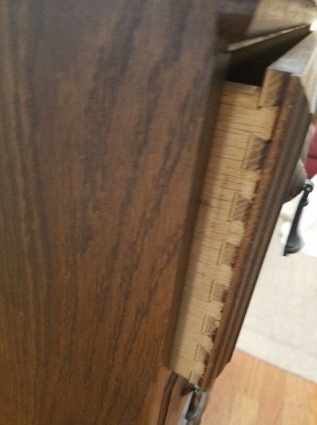 The side of a drawer, showing the construction.