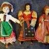 Several different dolls in traditional costumes.