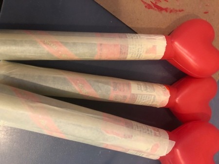 Several tubes covered in masking tape.