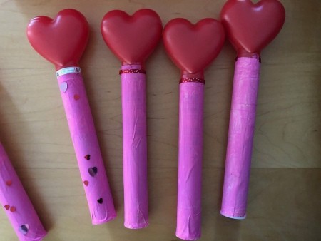 Adding gems to the painted tubes.