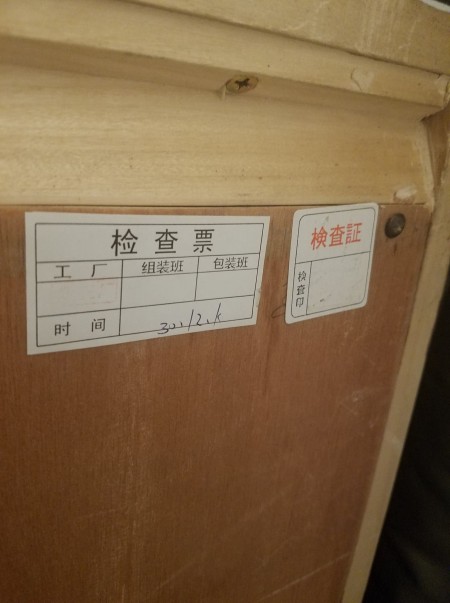 Chinese labels on the back of the furniture.