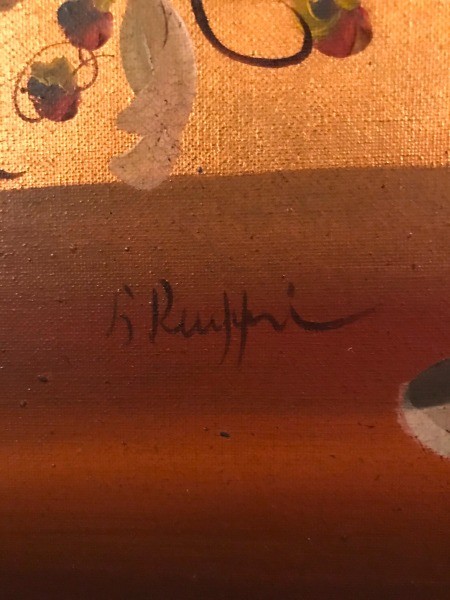 A signature on a painting.