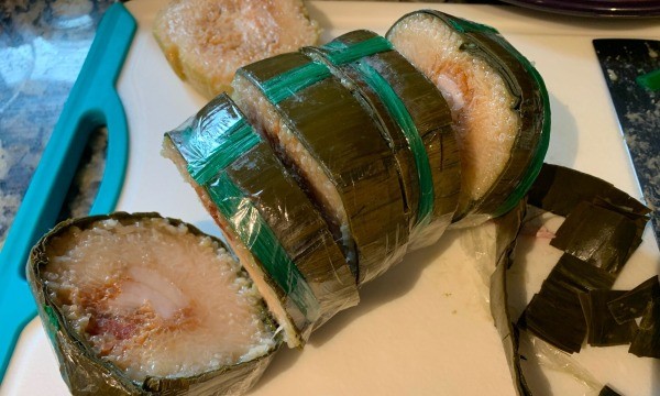 A roll of banh tet, sliced.