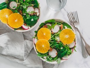 Salads with orange slices.