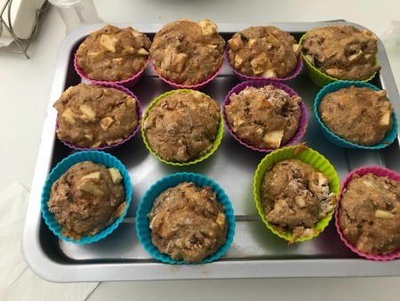 Baked muffins in silicone muffin cups.