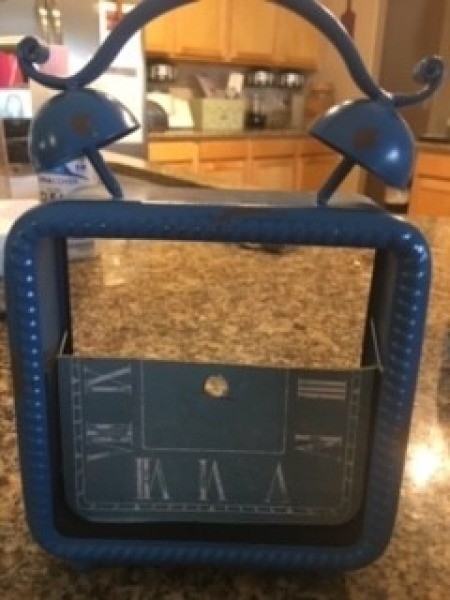 Cutting out part of the clock face.