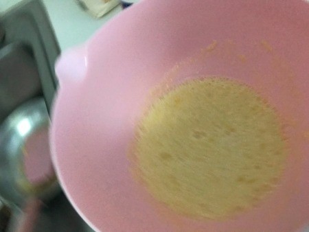 Adding the wet ingredients into a bowl.