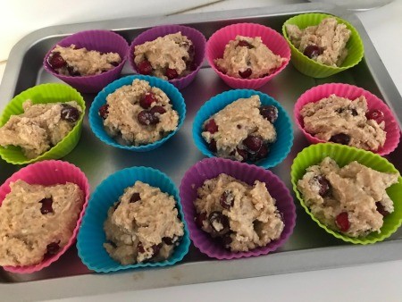Muffins on a cookie sheet.