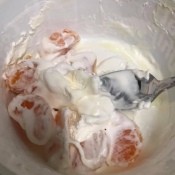Mandarin oranges mixed with whipped cream for an easy dessert.