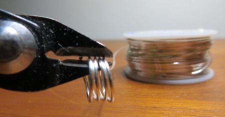 Making rings from a spool of wire.