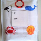 A decorated bubble mailer with designs from the sea.