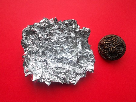 Making Shank Buttons the Cheap Way Using Concrete - crumpled foil