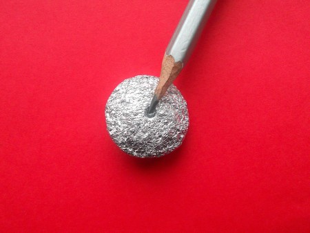 Making Shank Buttons the Cheap Way Using Concrete - button and pencil