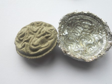 Making Shank Buttons the Cheap Way Using Concrete - when dry remove from the mold