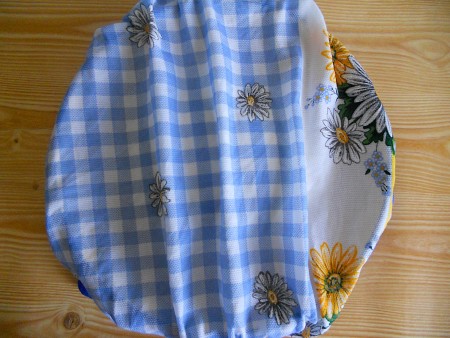 Covering the dough with a towel.