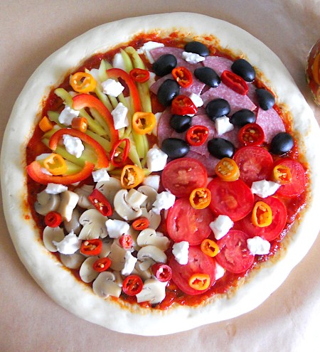The pizza with 4 quadrants of toppings.