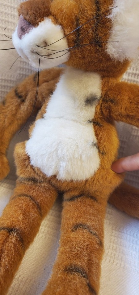 The belly of a stuffed tiger.