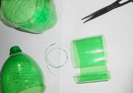 A soda bottle with the middle cut out.