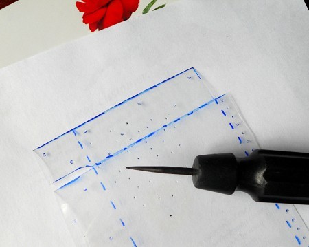 Adding holes to the plastic.